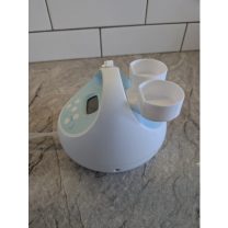 Anne sütü pompası şişe tutucu